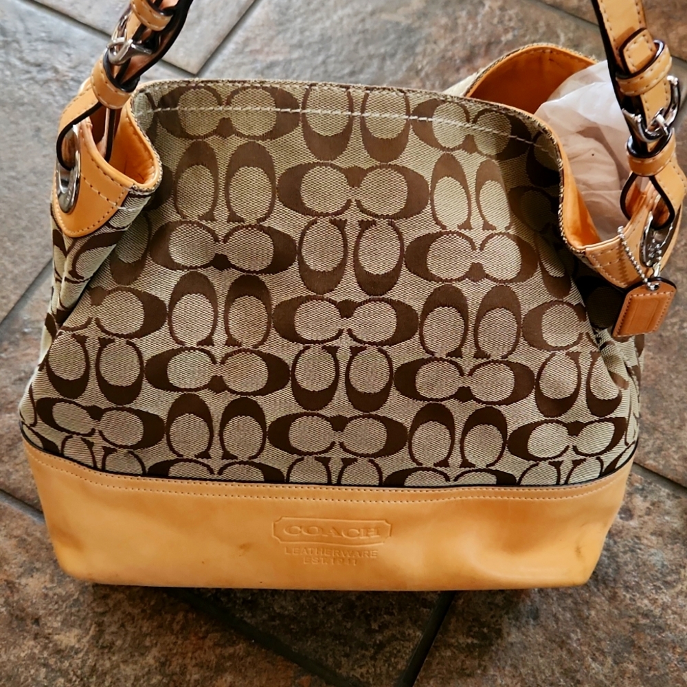 Classic Tan coach purse